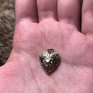 Vintage gold/silver engraved heart pendant with central flower